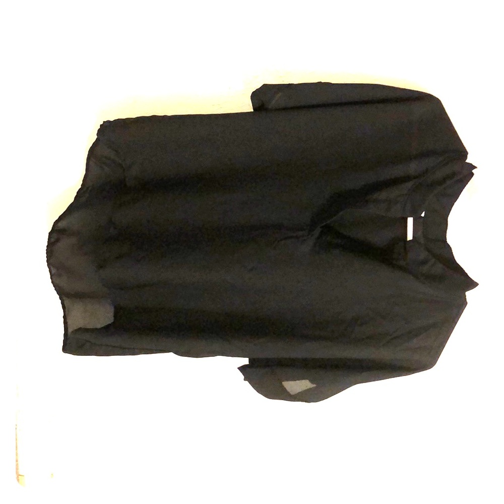 Black overlay shirt wears like an xl but says 3xl